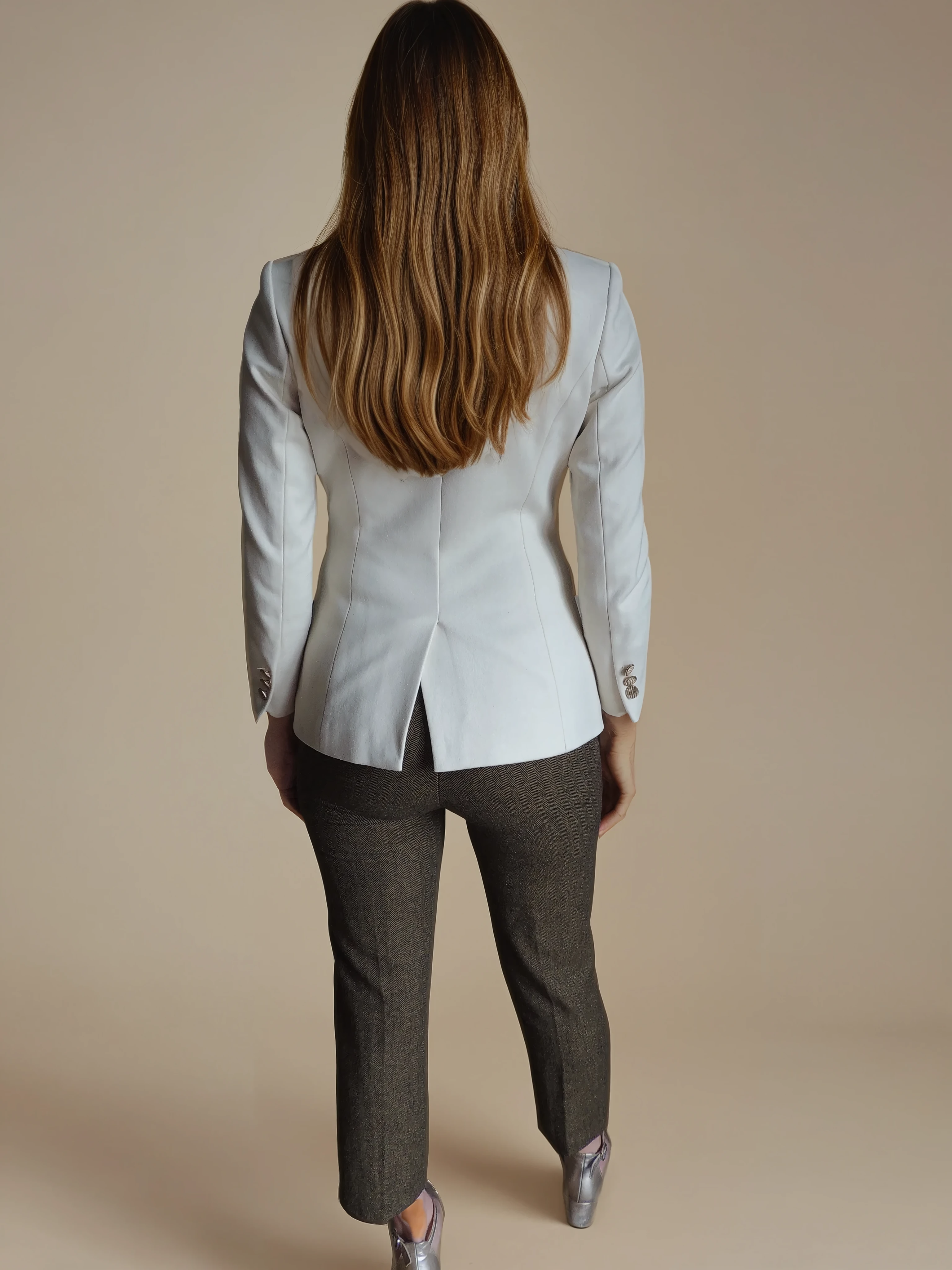 Chic brown trousers with a herringbone pattern