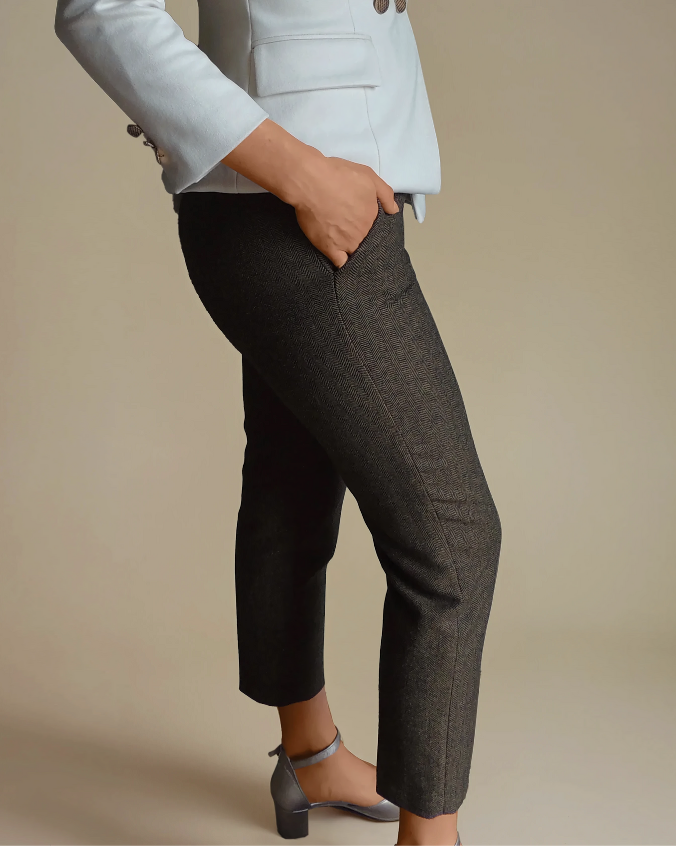 Chic brown trousers with a herringbone pattern