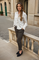 Chic brown trousers with a herringbone pattern